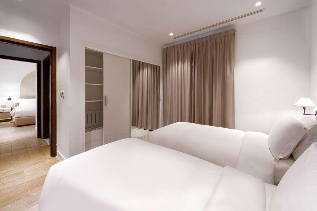 Mina Hotel & Residences Доха Номер фото